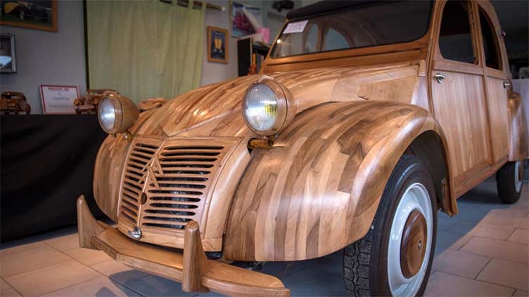 Tree-mendous ride: wooden vehicle sells for 210,000 euros