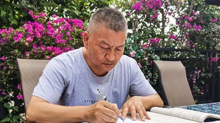 Self-made millionaire sits China varsity exams for 27th time