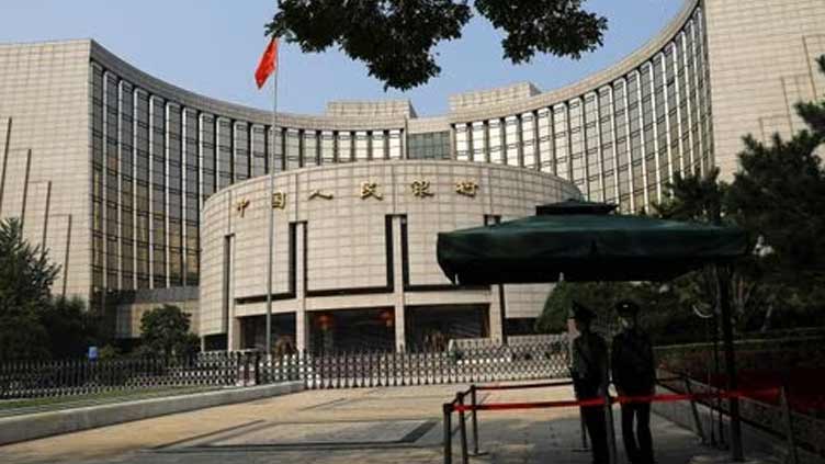 China's central bank cuts short-term borrowing cost for first time since Aug